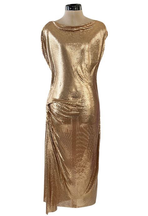 gold draped oroton dress.